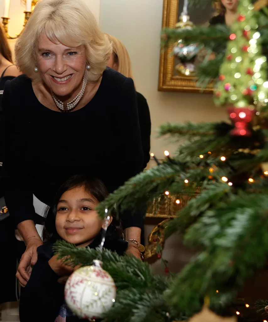 The duchess also helped the children decorate the Clarence House Christmas tree.