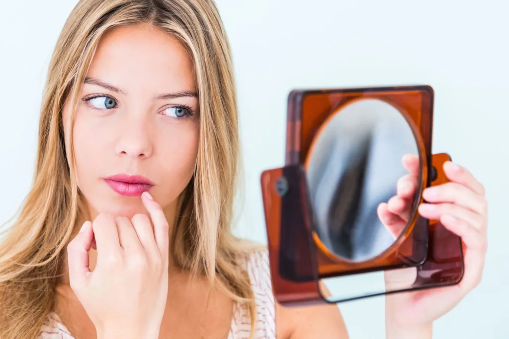 Woman with mirror