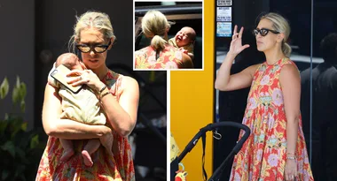 Phoebe Burgess clutches newborn son to chest as she shops in Sydney