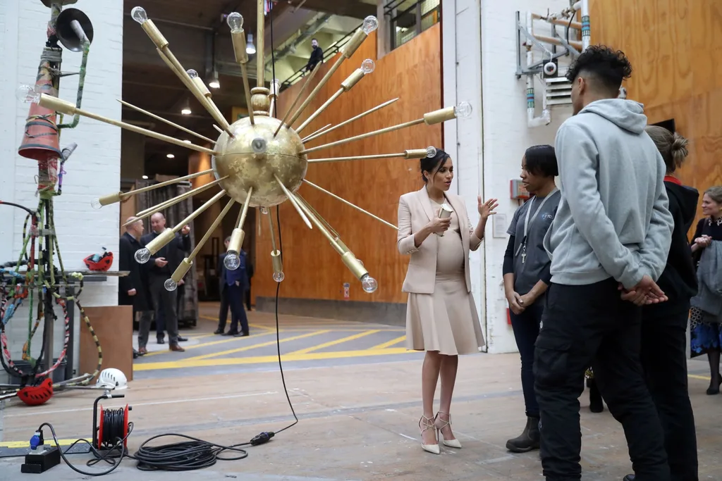Meghan's bump in pale pink dress