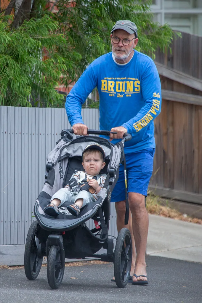Australian icon Gary Sweet, 61, heads to play park with son Percy