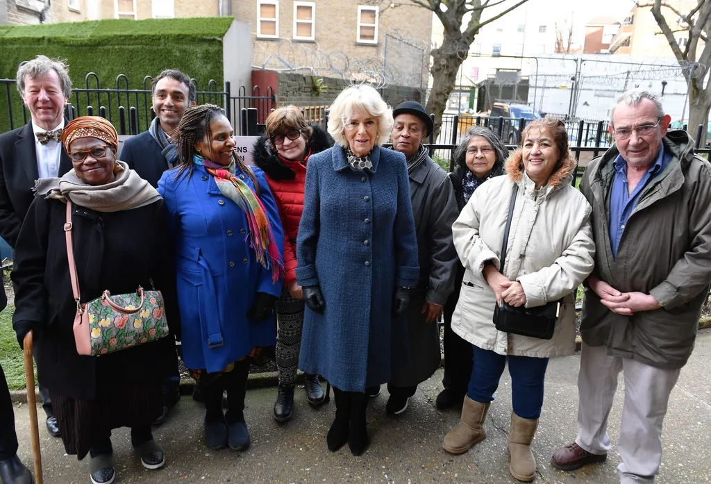 Camilla meets people who grow the garden produce
