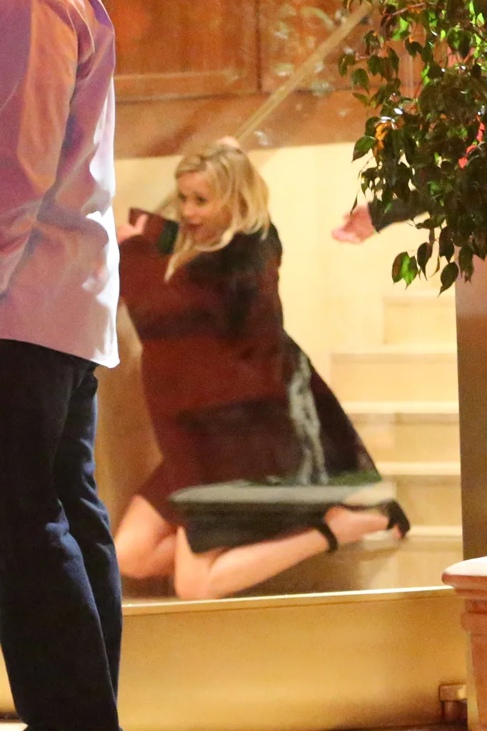Reese Witherspoon takes a tumble