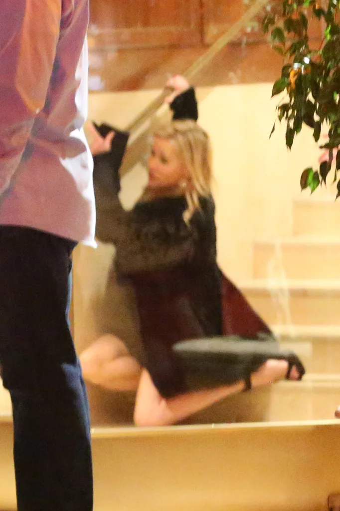 Reese Witherspoon takes a tumble