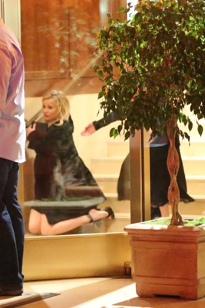 Reese Witherspoon takes a tumble