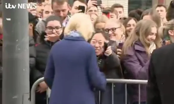 Camilla shocked by hug from fan
