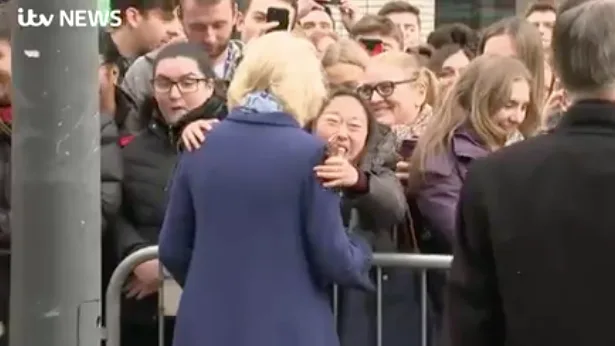 Camilla shocked by hug from fan