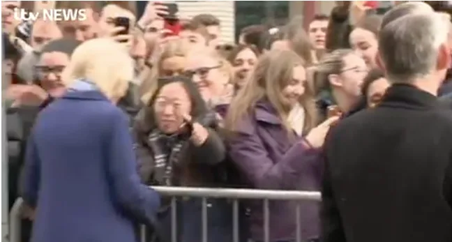 Camilla shocked by hug from fan