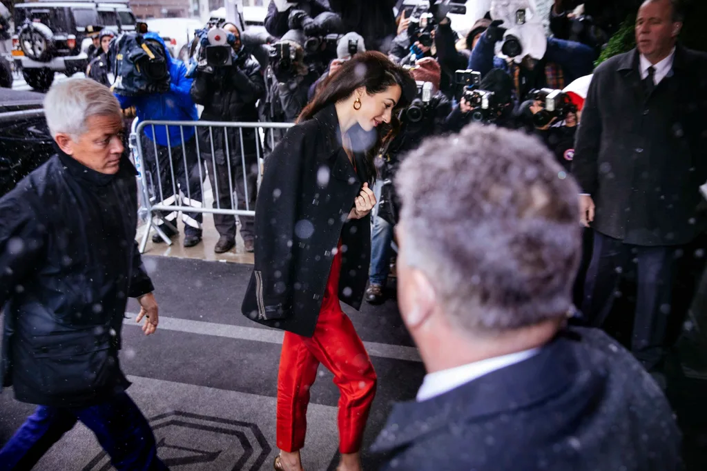 Amal Clooney arrives at Meghan Markle's baby shower