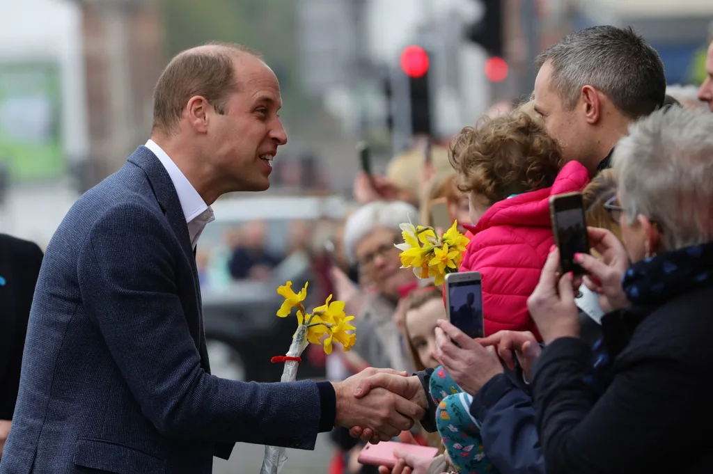 Prince William shakes hands with well-wishers