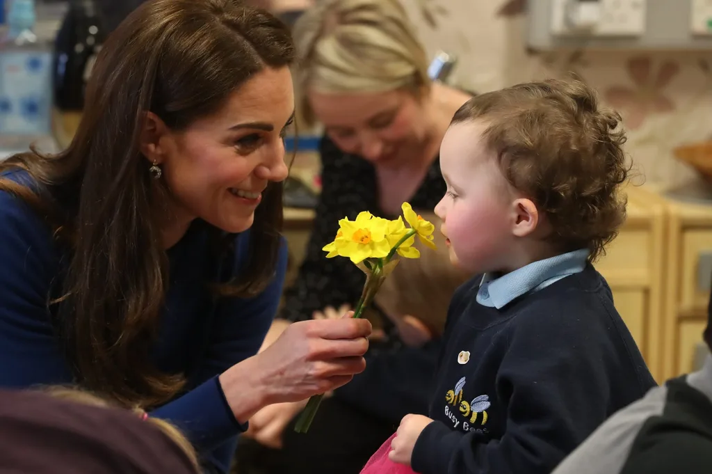Kate Middleton with a child