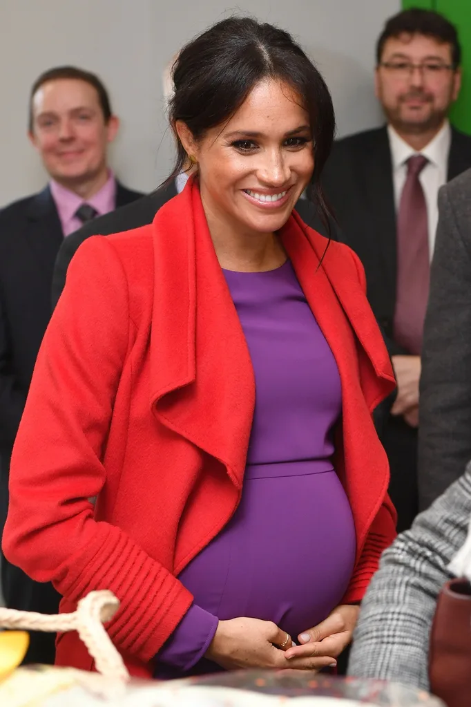Meghan in red and purple