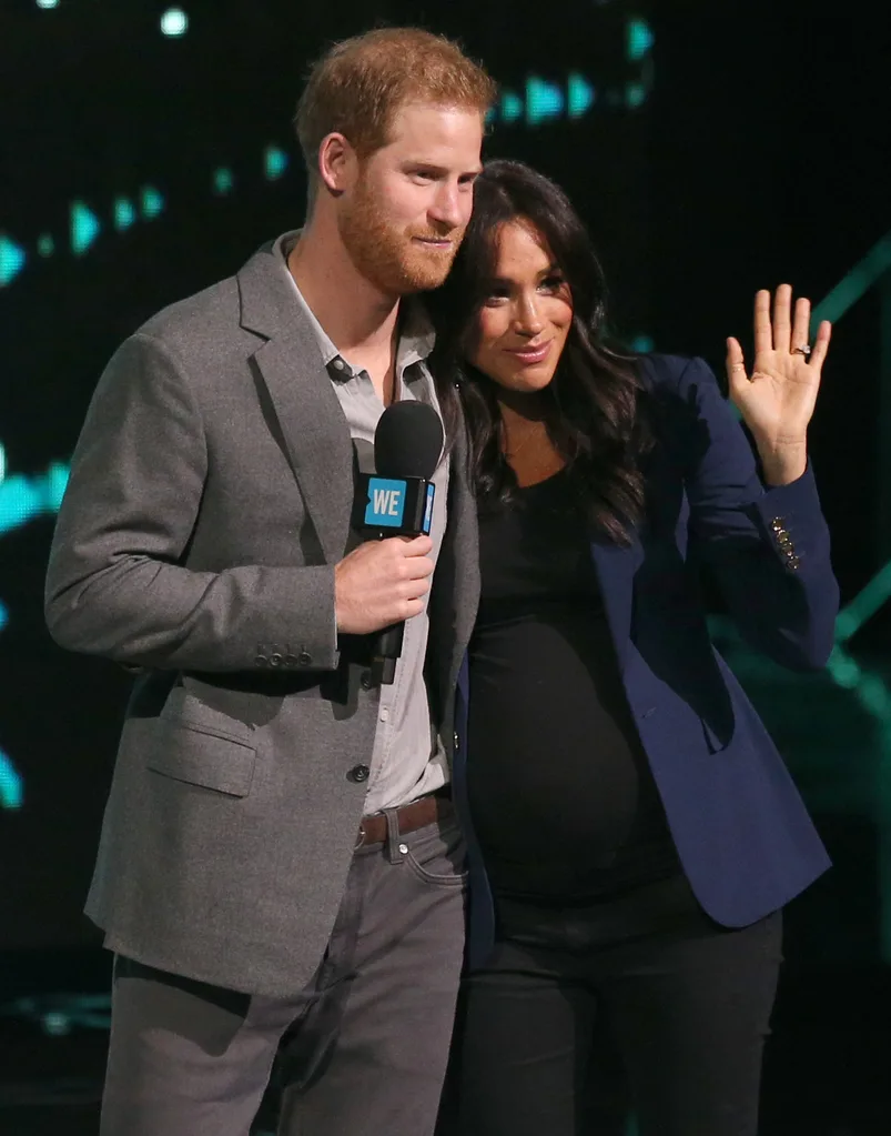Meghan waves to fans