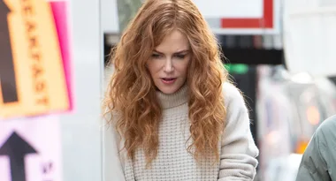 Slender Nicole Kidman wraps up in sweater on set of new movie