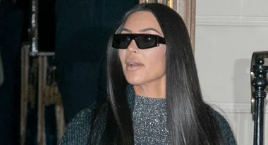 Kim Kardashian wears BIZARRE see through catsuit for dinner in Paris