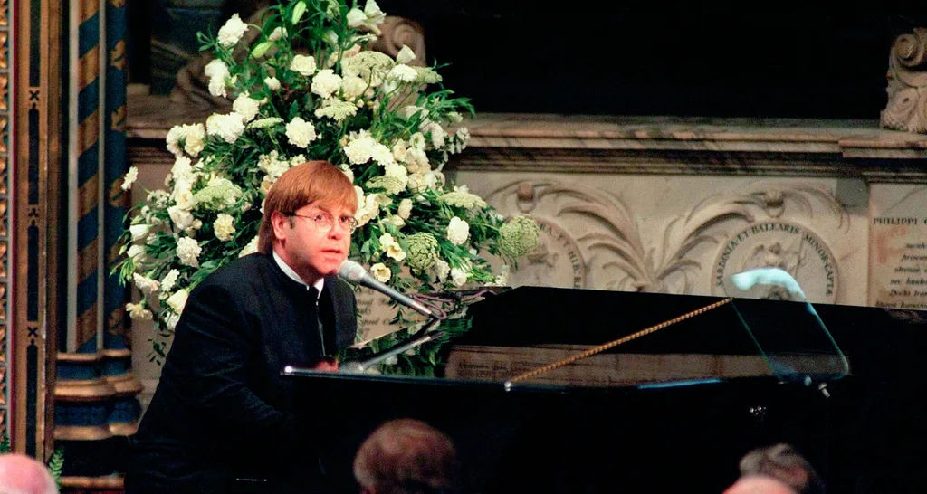 Elton John performs at the funeral of Princess Diana
