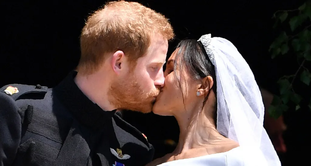 Prince Harry and Meghan Markle share their first kiss as husband and wife