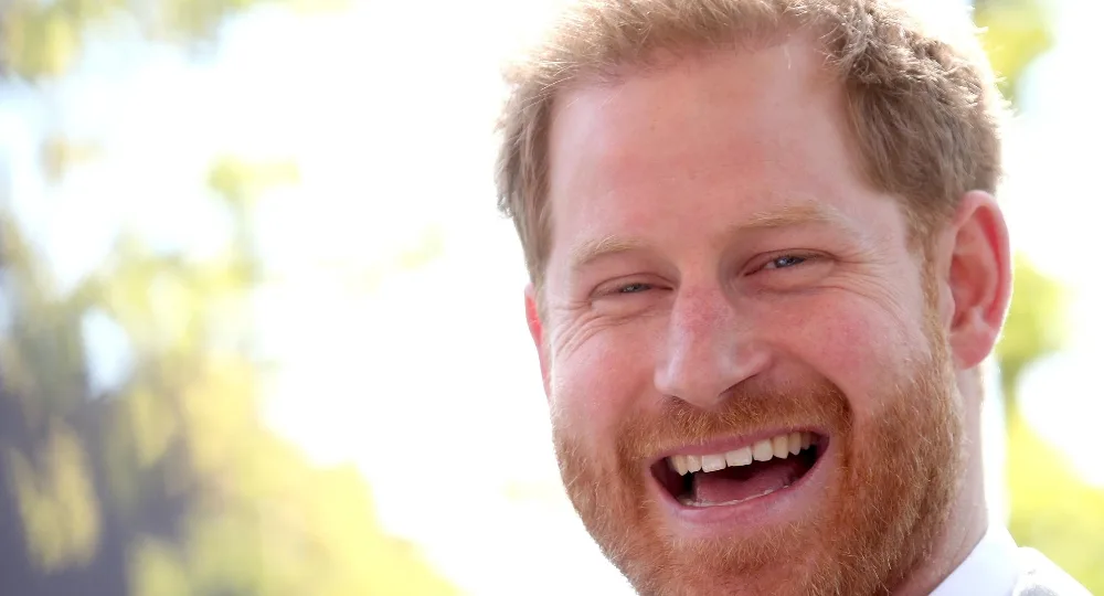 Prince Harry was beaming as he stepped out in London