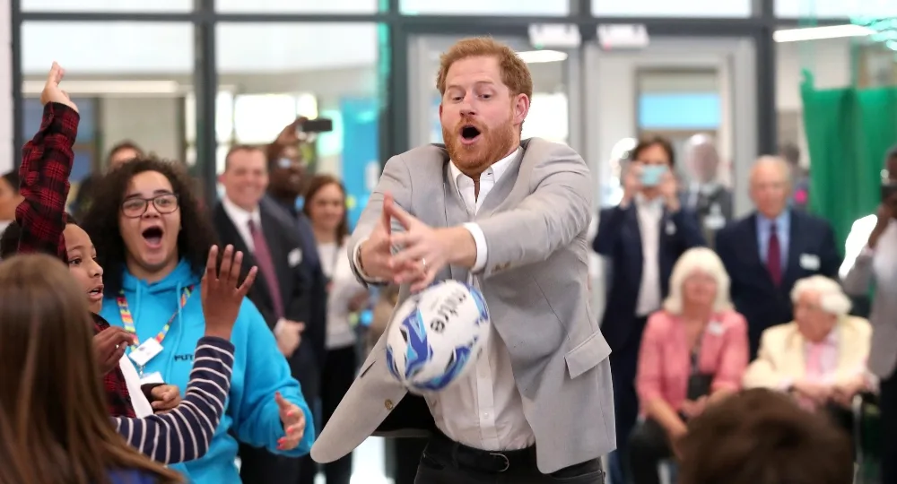 Prince Harry meets young fans at a newly opened youth centre in London
