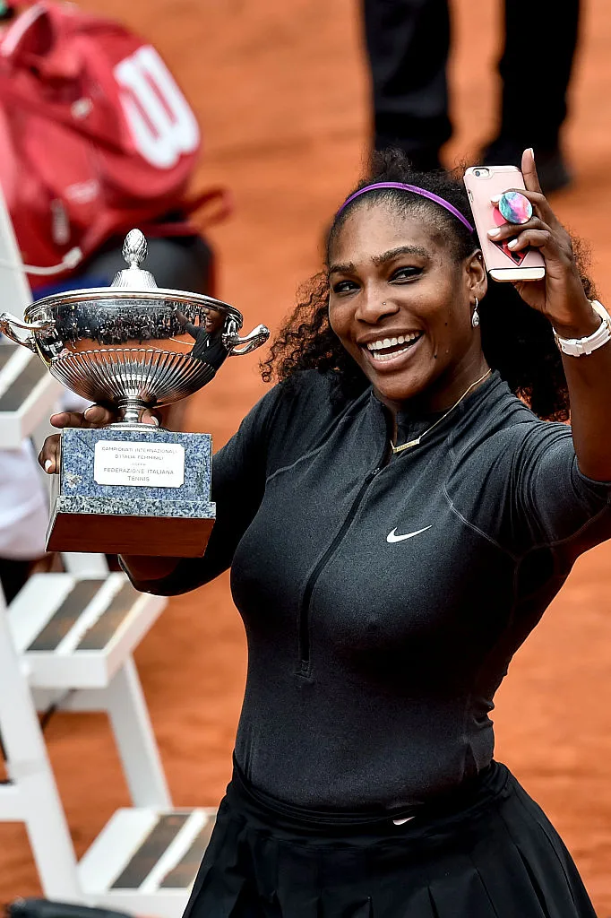 Serena Williams holding a trophy