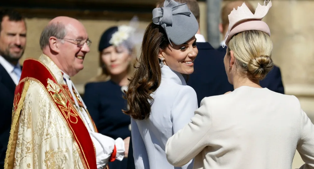 The Duchess of Cambridge shares a smile with Zara Tindall outside the church
