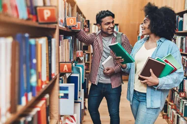 A girl and a guy at a bookstore