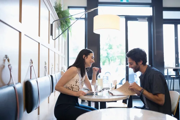 A couple on a date in a cafe