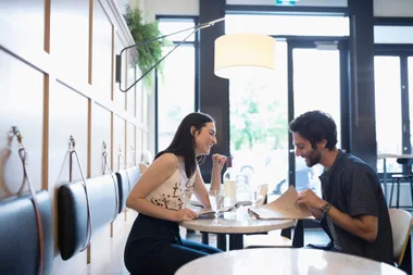 A couple on a date in a cafe