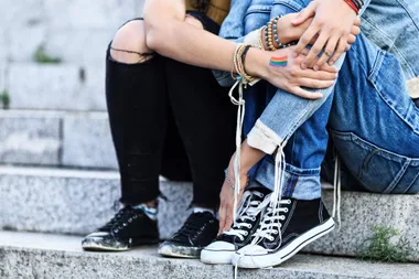 Two people embracing on stairs