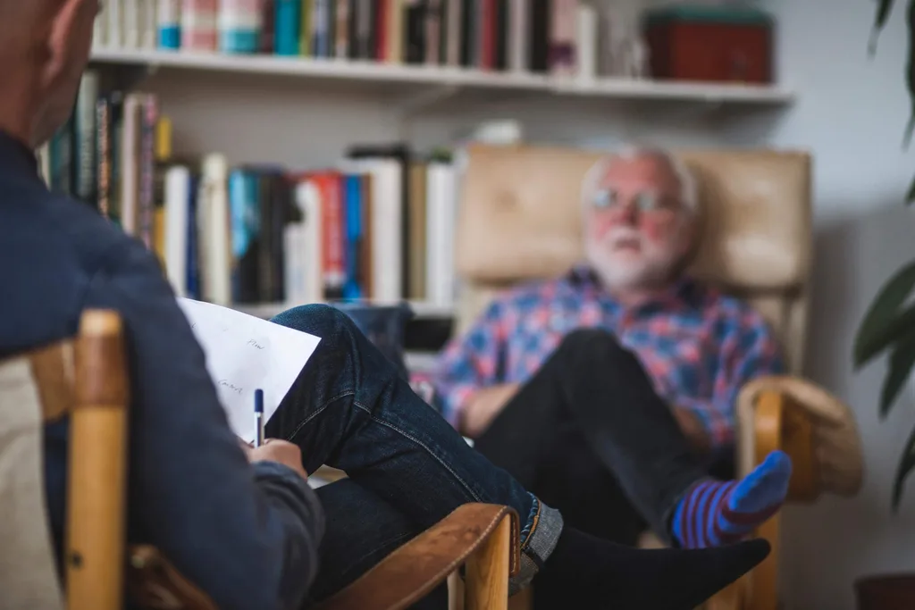 A psychologist talking to a patient