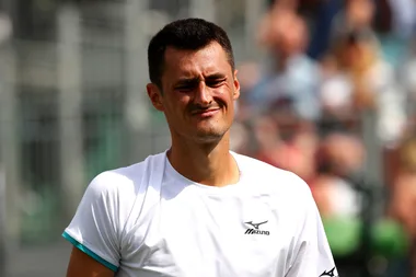 Bernard Tomic fined for ‘pathetic’ performance