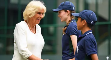 Camilla is all class as she greets fans at Wimbledon