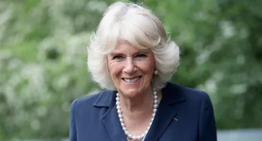 Camilla shows her sporty side in a ping pong match against the RAF