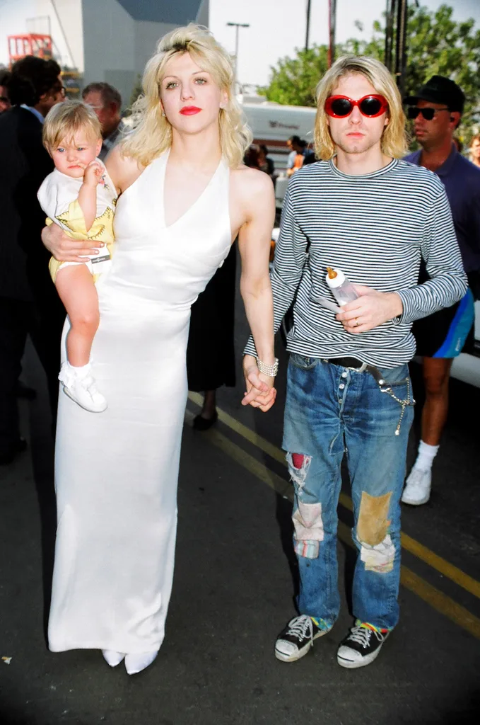 Kurt Cobain with his partner Courtney Love and their daughter Frances Bean Cobain in 1993