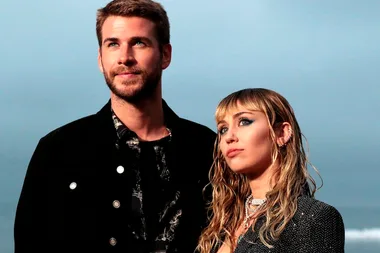 Liam Hemsworth looks alone and downcast in Melbourne