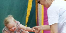 PHOTOS: Zara and Mike Tindall&rsquo;s daughter seen taking first steps in public and she looks EXACTLY like her dad