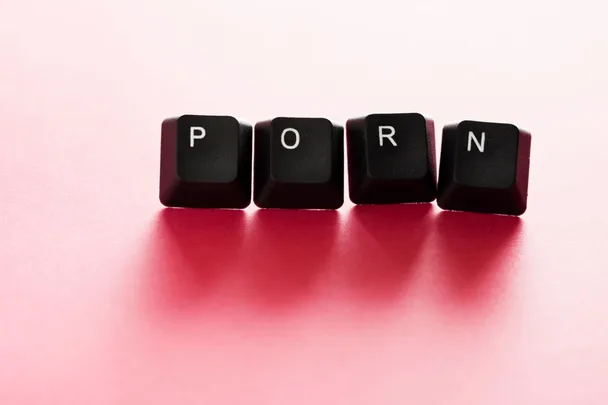 Keyword letters showing the word 'porn' against a pink background