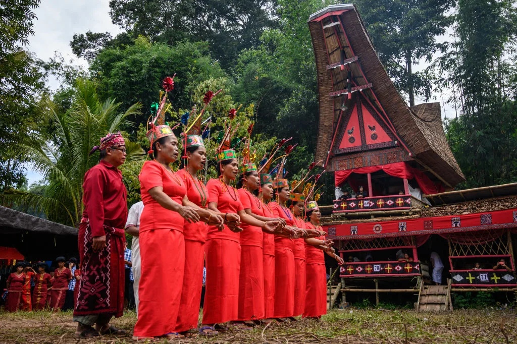 Townspeople in a Tana Toraja village performing a traditional ritual