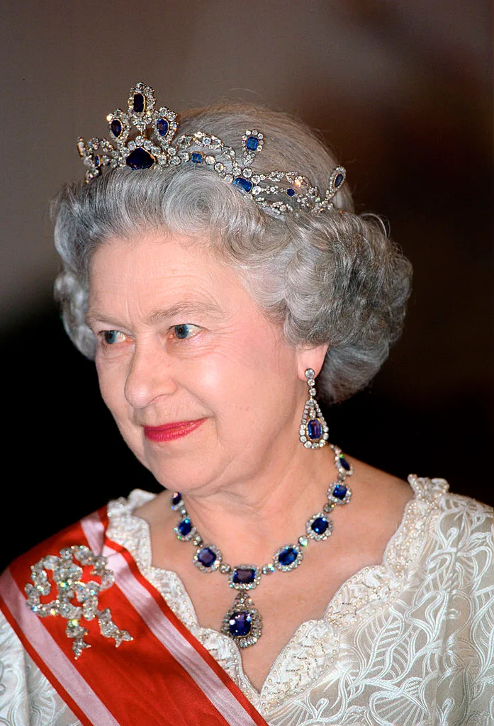 Queen Elizabeth II wearing a sapphire and diamond tiara at a banquet in Prague