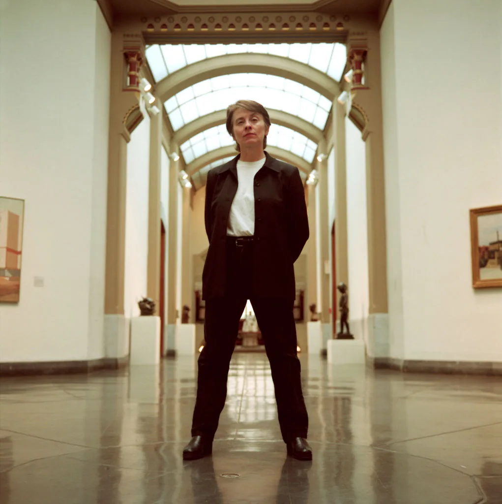 Camille Paglia pictured standing in an art gallery