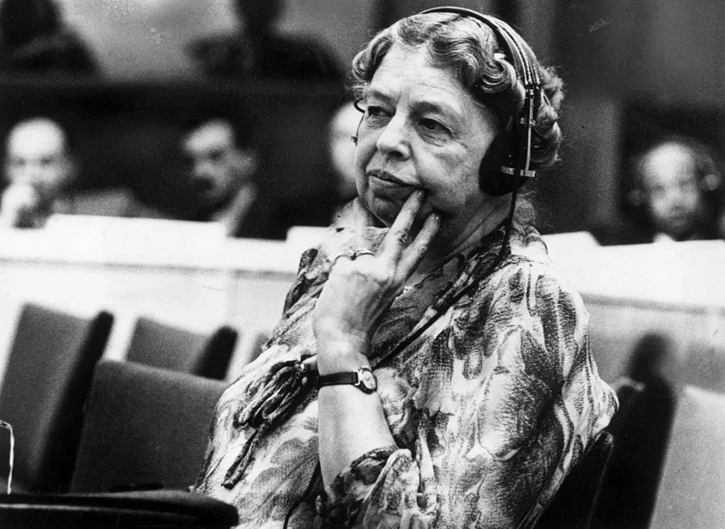 Eleanor Roosevelt pictured in black and white wearing a headset