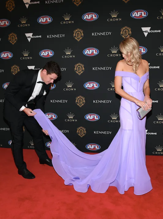 Lachine Neale of the Lions and his partner Julie Neale arrives ahead of the 2019 Brownlow Medal