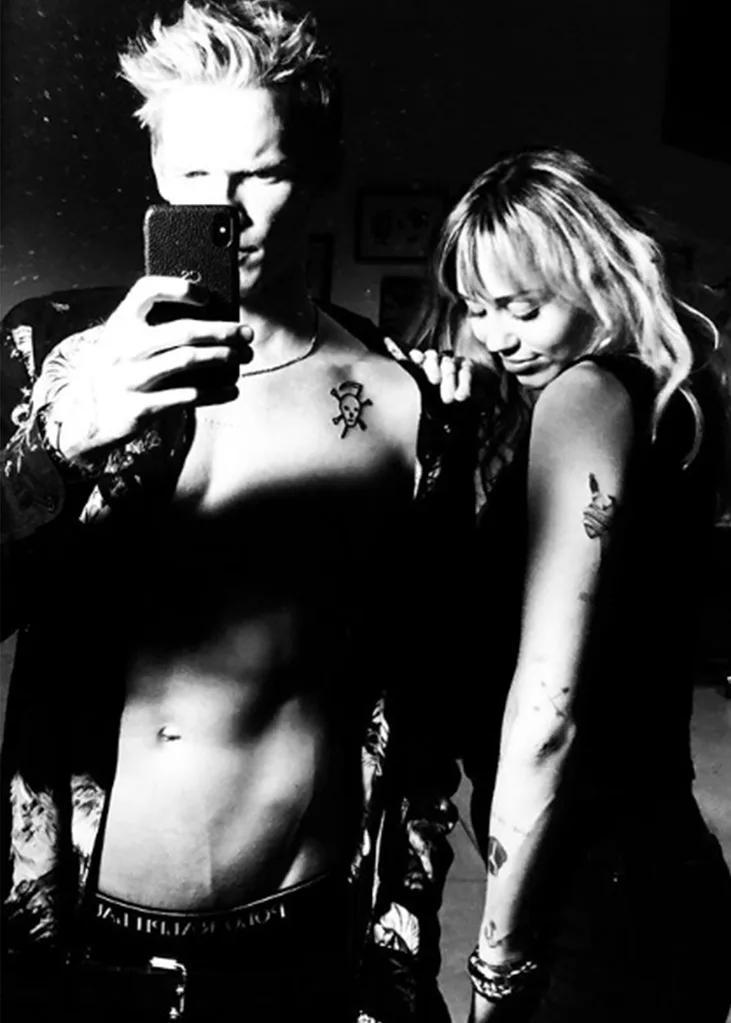 Miley Cyrus Cody Simpson tattoos
