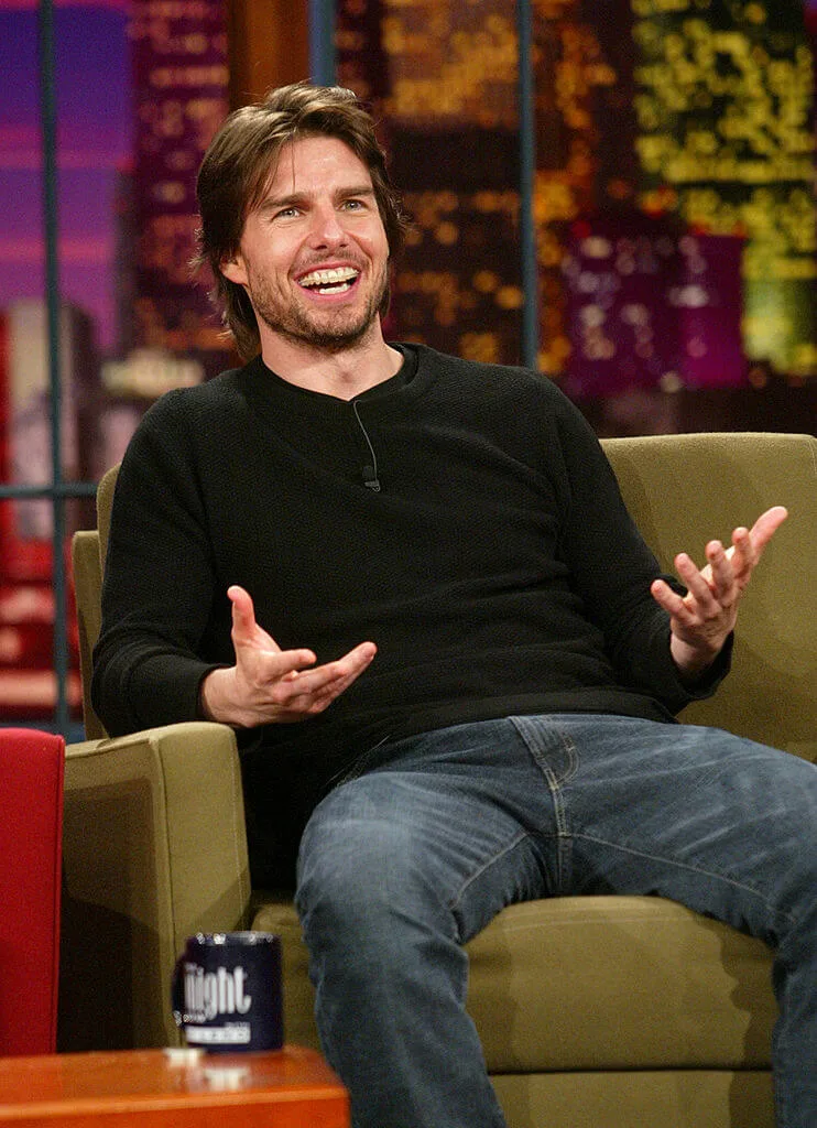 Tom Cruise smiling showing his teeth braces on The Tonight Show