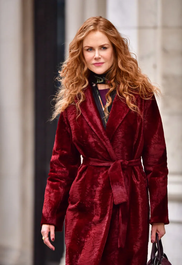 Nicole Kidman in a red velvet coat