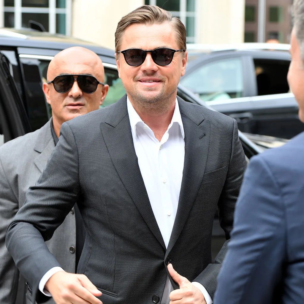 Leonardo DiCaprio with a suit and a white shirt