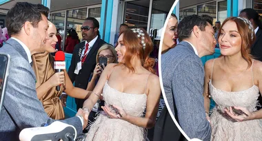 Rob Mills sneaks a cheeky kiss from Lindsay Lohan at the Melbourne Cup