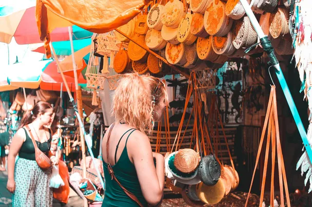 A woman shopping in clothing stores in Ubud