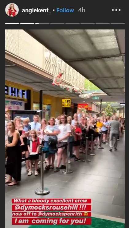 Angie Kent shows of line for book signing