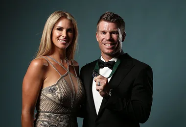 Candice Warner and David Warner posing together after winning the Allan Border Medal in 2017